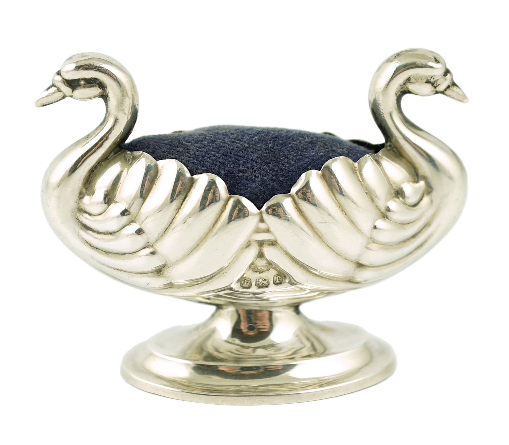 A late Victorian novelty silver pin cushion, modelled as a double headed swan, makers mark rubbed